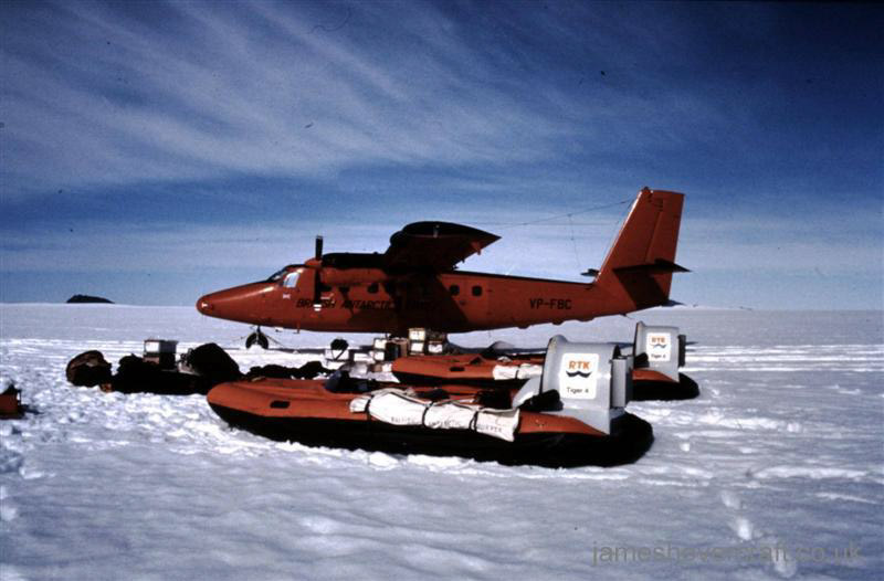 Tiger 4 hovercraft as used in the 70s by the British Antarctic Survey - Two Tiger 4 craft in front of the island hopping transport plane (credit: Malcolm Hole).